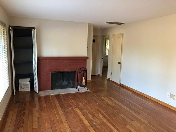 Living room wood burning fireplace