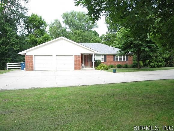 All brick home on 145 acres