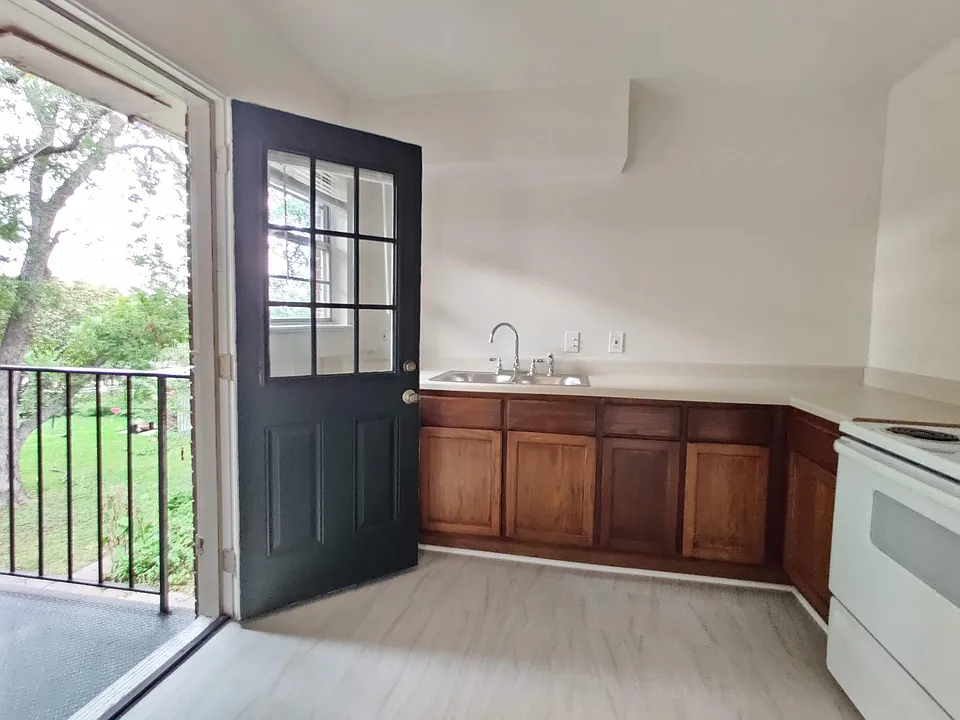 Spacious kitchen with newly installed flooring