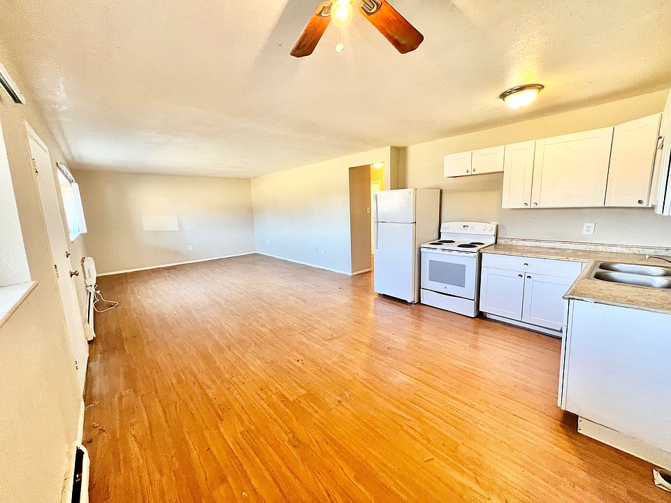 Experience seamless living with this open-concept kitchen and living space, blending style and comfort. Experience seamless living with this open-concept kitchen and living space, blending style and comfort.