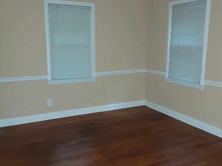 Primary Bedroom with fresh Sherwin Williams paint.