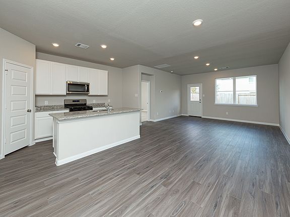 Dining Area to Kitchen and Family Room
