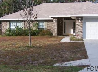 7 Poinsettia Ln, Palm Coast, FL 32164