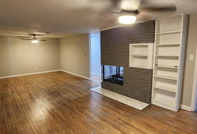 Living and dining room with Fireplace.