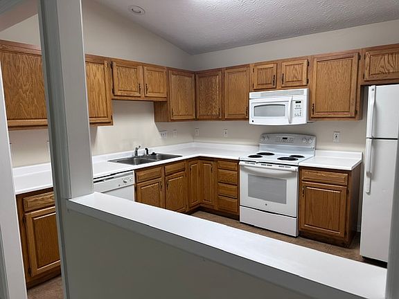 Eat-In Kitchen; equipped with dishwasher, oven, microwave, refrigerator