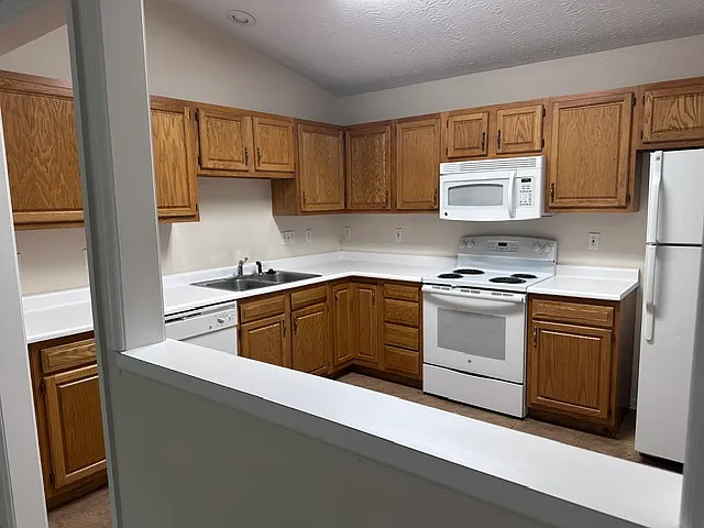 Eat-In Kitchen; equipped with dishwasher, oven, microwave, refrigerator