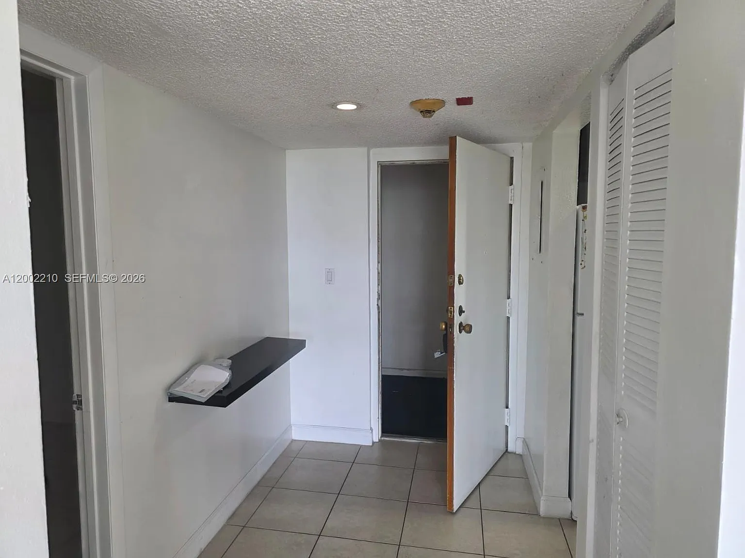 Half Moon Towers Condo — Photo 1