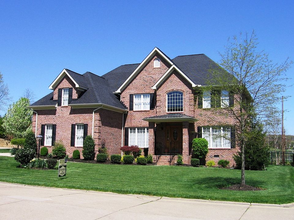 All Brick with 3 car garage