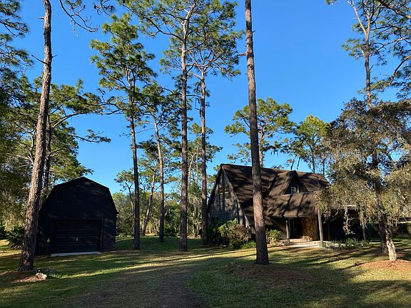 View from gate of house & garage