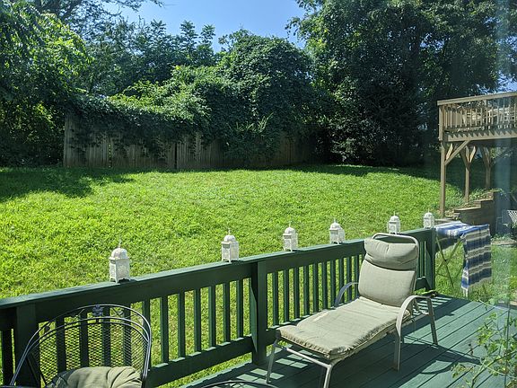 porch runs along the whole back (south side) of the house