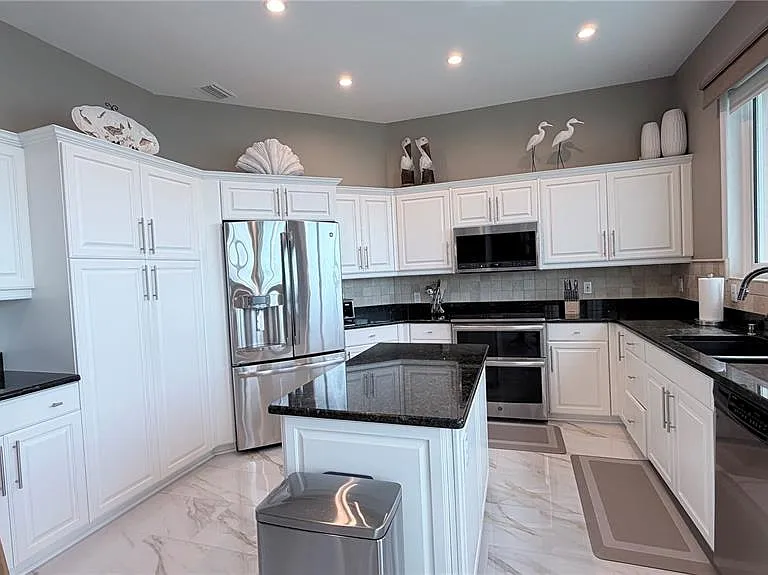 218 Sand Key Estates Dr — Photo 29