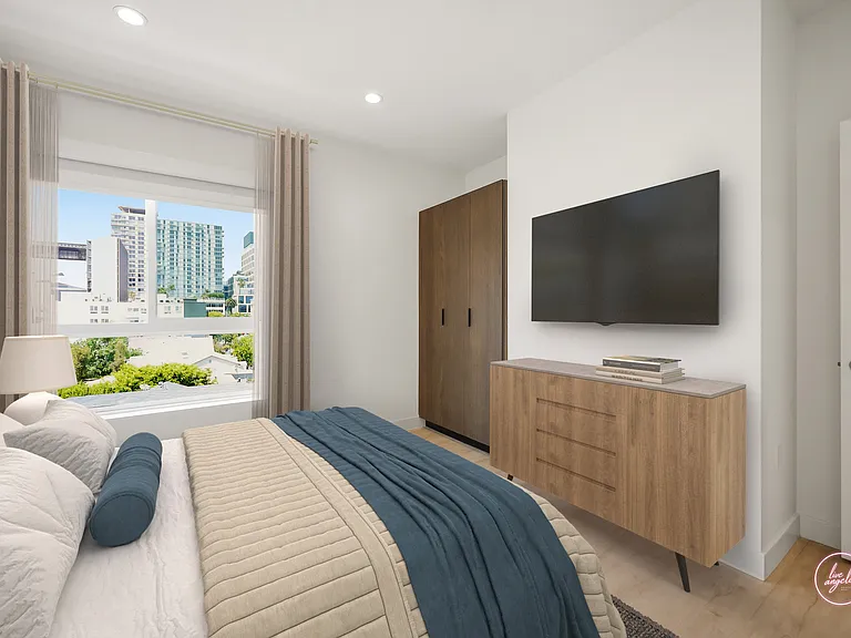 Bedroom with Large-Size Windows, Cabinet Storage, and Natural Lighting - Stevie Floor Plan
