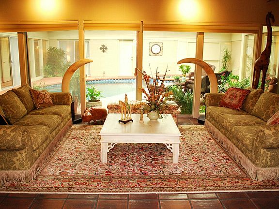 Living room next to the pool