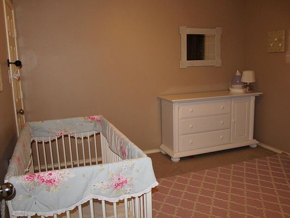 1st floor bedroom has been updated with new paint and hardwood floors