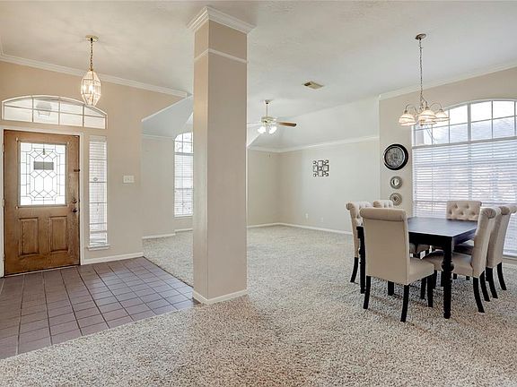 The carpet throughout the home has been well-maintained and pairs perfectly to the soft neutral tones on the walls.