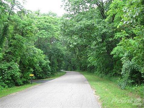 Point O Woods Drive winds through beautiful stands of mature trees.  Watch for deer crossing.