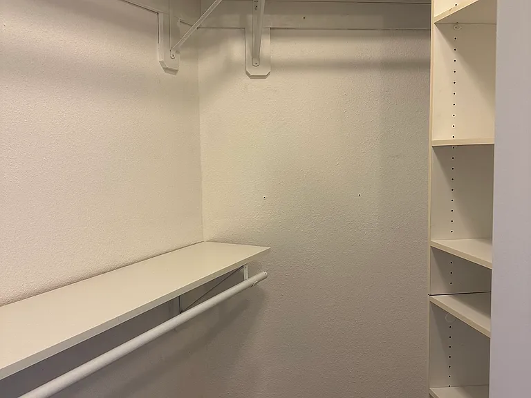 Huge walk in closet! Photo only shows a portion of the closet. Much bigger is size.