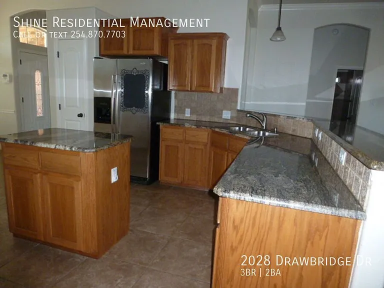 2028 Drawbridge Dr — Photo 11