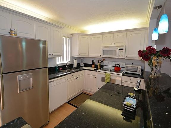 4th image of 7920 Sun Island Dr S APT 106
