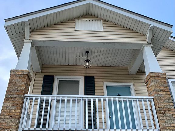 This charming beach bungalow is located on a corner lot in Midtown.