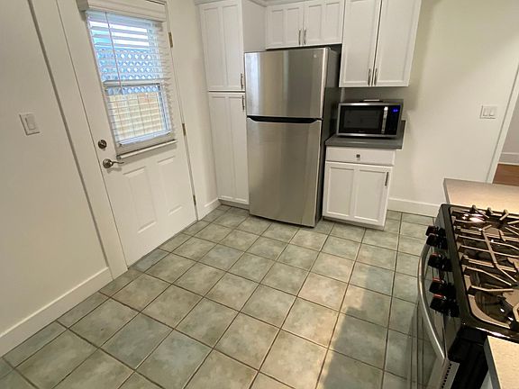 New Fridge and Microwave and Back Door To Side Yard