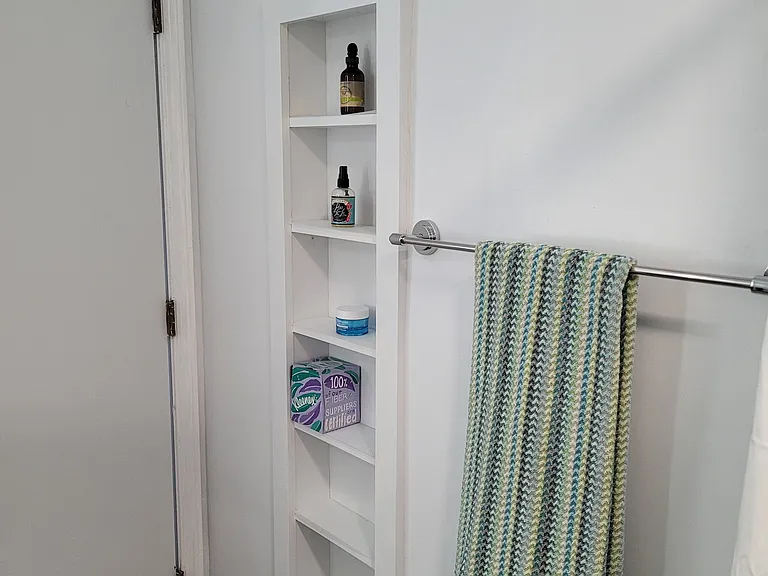 223 - Custom shelves in bathroom.