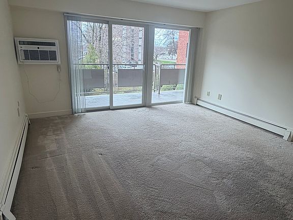 All New carpeting~ slider leads to private balcony