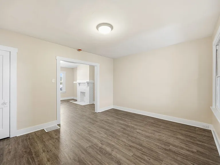 Charming Updated 2BR Home with New Flooring & Rear Porch — Photo 11