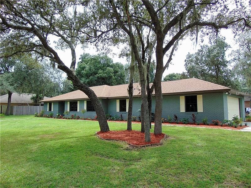 View from corner lot showing side garage