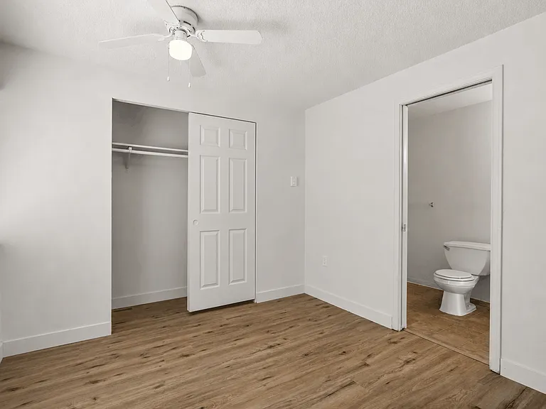 Bedroom with large window, closet, and instant access to Ensuite Bedroom with large window, closet, and instant access to Ensuite