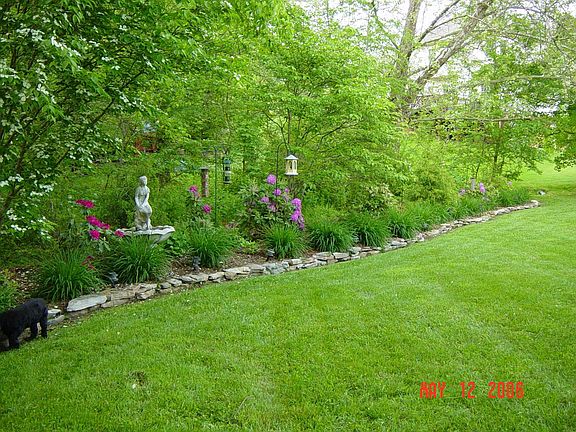 One of professionally landscaped low maintenance beds