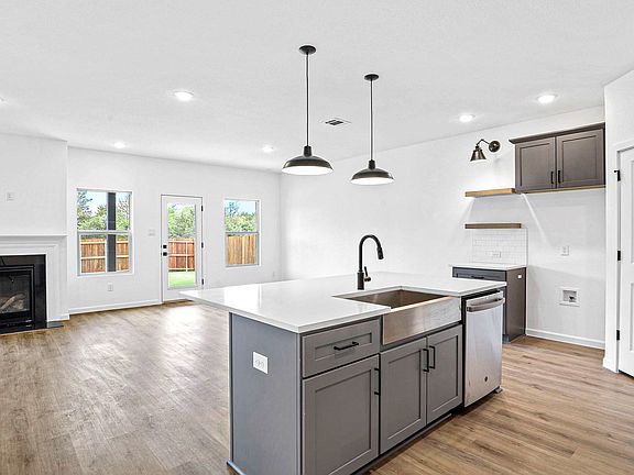 Bright and open living area with gorgeous flooring