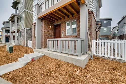 Detached townhouse at end of quiet street.
