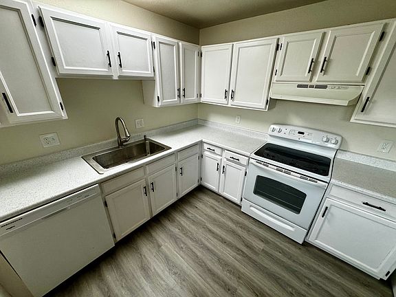 This photo is from another apartment in the same building to show the new countertops NOW INSTALLED in 6922 Peyote. Replacement photos coming shortly!