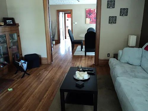 living room with refinished Hardwood floors