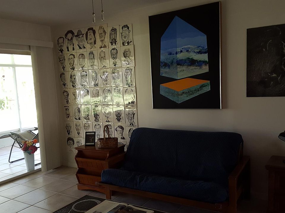Living room. There are 2 leather over-sized lounge chairs not shown