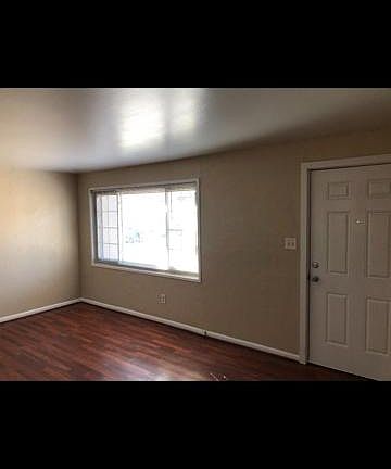 Living room with large picture window with Pike's Peak views!