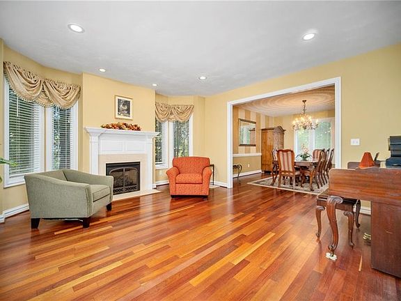 Formal living room with natural gas fireplace