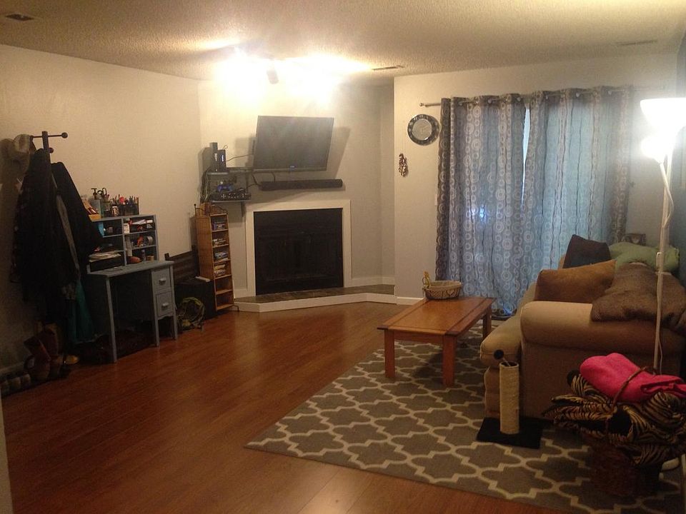 Living Room with Fireplace (for candles only); drapes availa