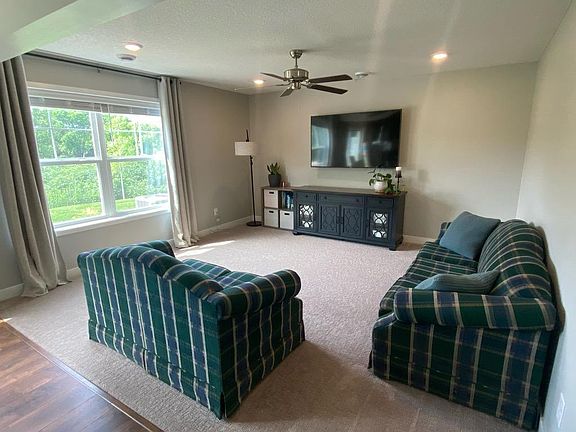 Living room offers great lighting and wall-mount ready for your TV!