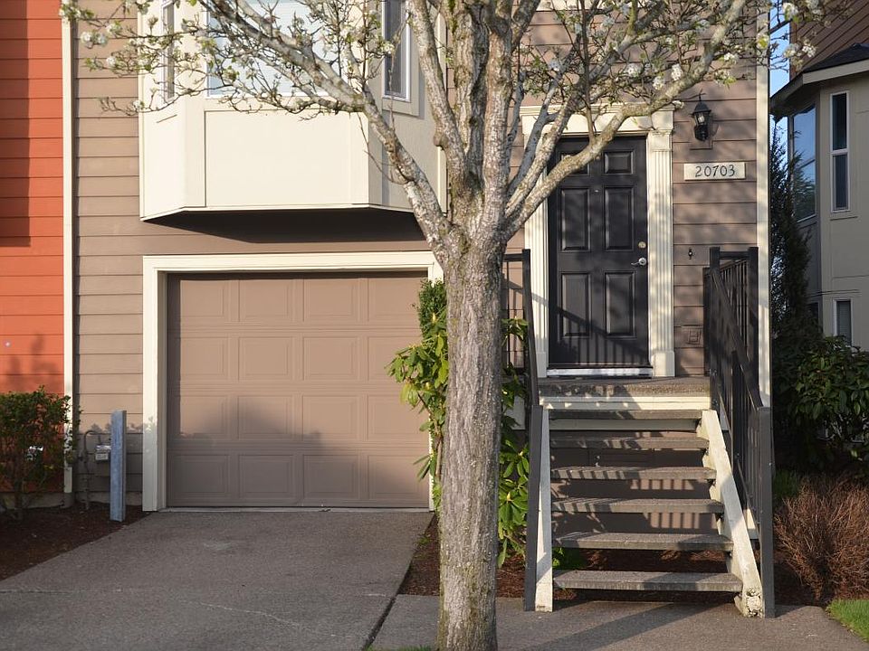 Front with garage and driveway