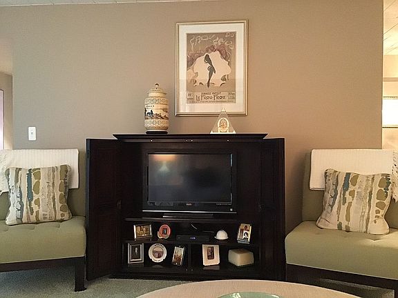 TV cabinet with flat screen.