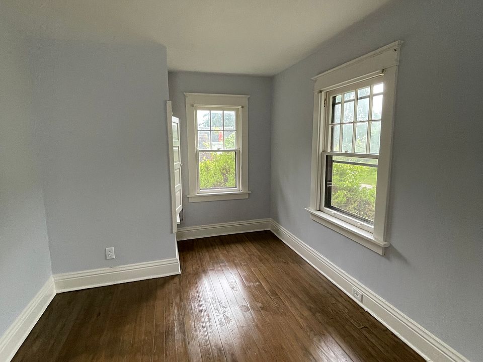 Other side of living room with short closet