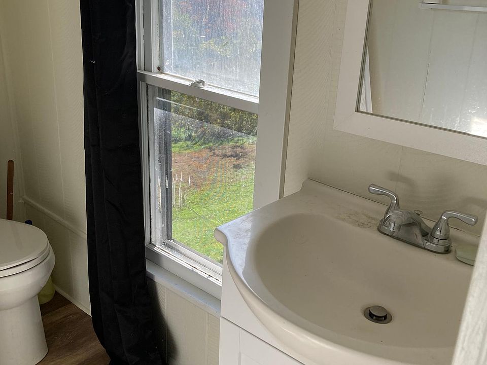 Main level bathroom w/ nice natural light.