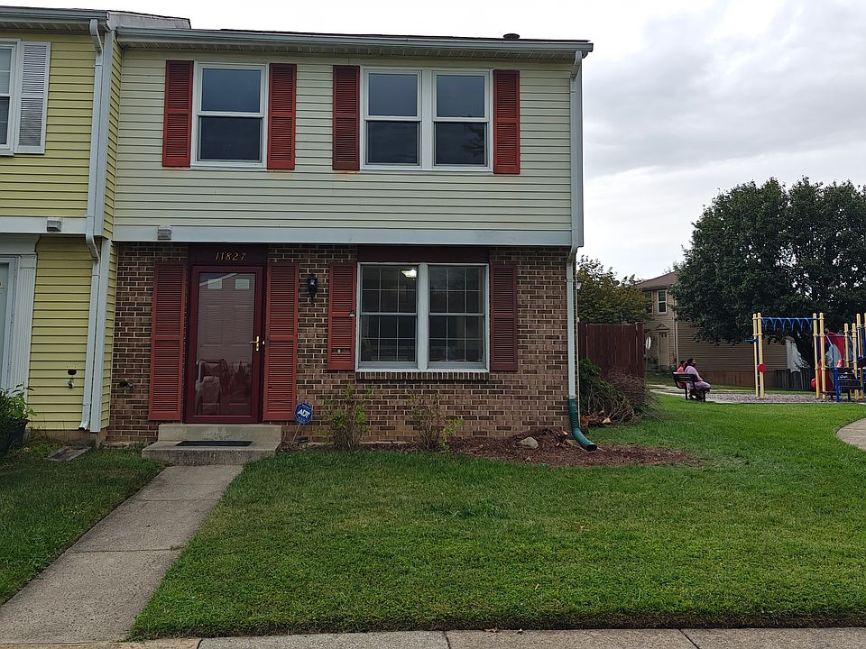 end-unit townhouse with adjacent community playground