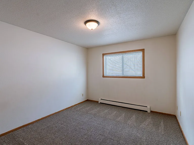 Fargo, ND Schrock Apartments | Bedroom