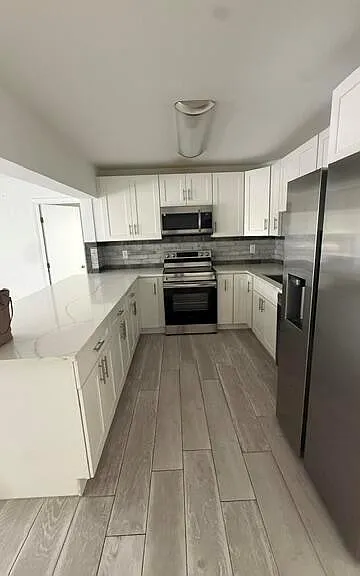 1730 NE 56th Ct — Photo 9