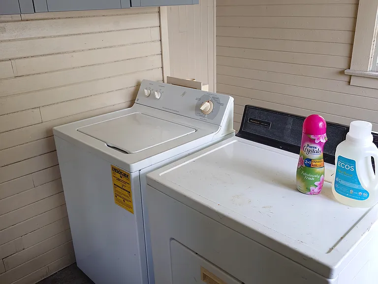 Washer and dryer provided in unit.
