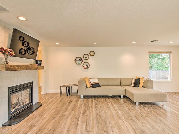 Spacious living room area with fireplace