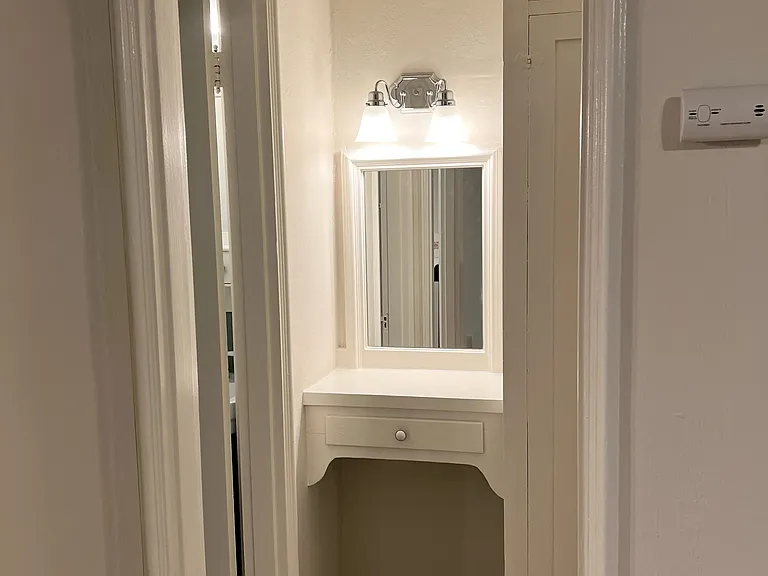 Built-in vanity in walk-in closet